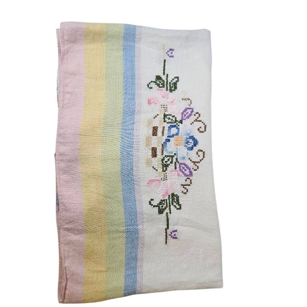 Vintage table cloth with intricate hand cross- stitch floral embroidery . 50"X10